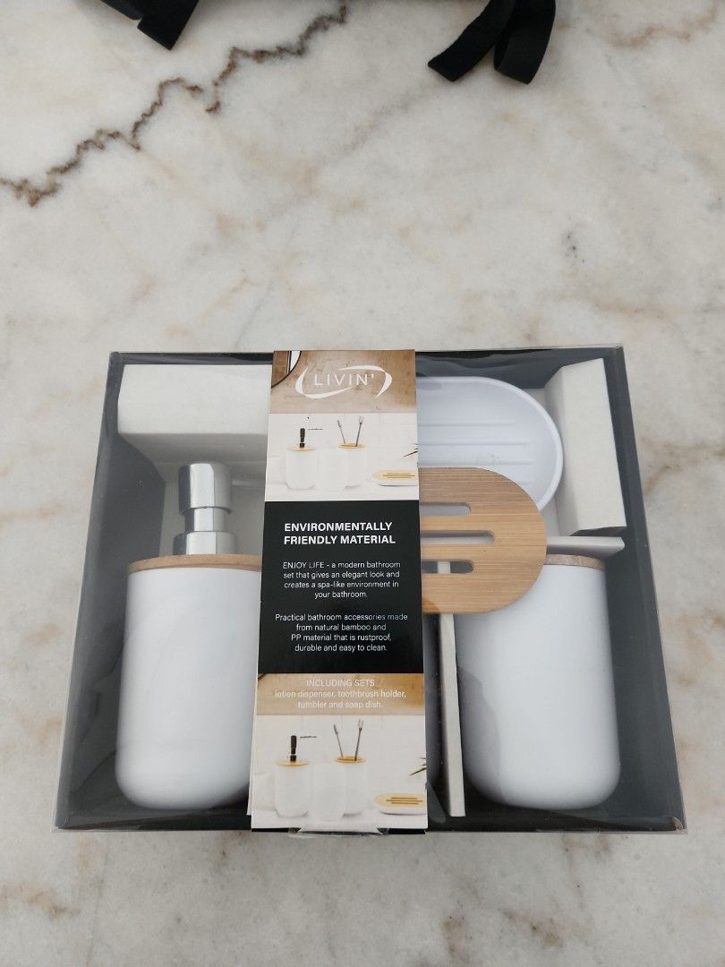Bathroom Essentials (Category: Bathroom & Kitchen Fixtures) located in Singapore. Submitted by curious_kaga (Listing ID 1350754699, Image 1). Description: Lotion Dispenser Toothbrush holder Tumbler Soap dish.