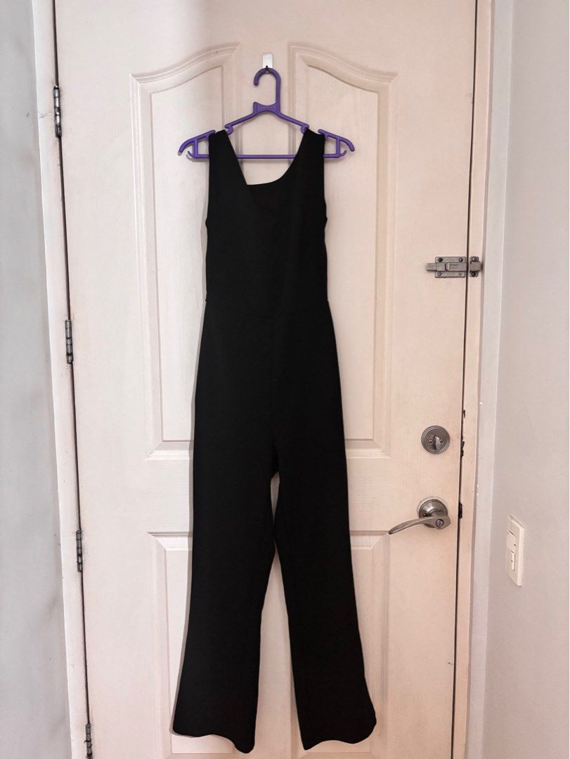 Black Backless Jumpsuit (Category: Jumpsuits) located in Manila. Submitted by mscyaa.declutter (Listing ID 1350839431, Image 3). Description: ◾️used only once for valentines dinner ◾️has some adjustments (tinahi) on the sides so my side boob won’t show ◾️length laid flat: 41” for reference, i’m 5’2” | 32a | 27-28 waist size in the pics.