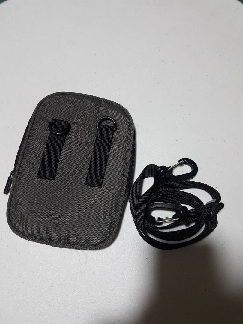 Cellphone / Small Sling Pouch Halo Original (Category: Belt bags, Clutches and Pouches) located in Quezon City. Submitted by 1_grit_hobbies (Listing ID 1350836146, Image 2). Description: Original Used only once tapos tinago na Phone lang kasya and wallet/ small size MOP: Gcash MOD: Lalamove, JNT Loc: Tandang Sora, Quezon City With signs of usage (paint chips/scratches/imperfections) What you see is what you get Preloved No returns, no refunds Ite