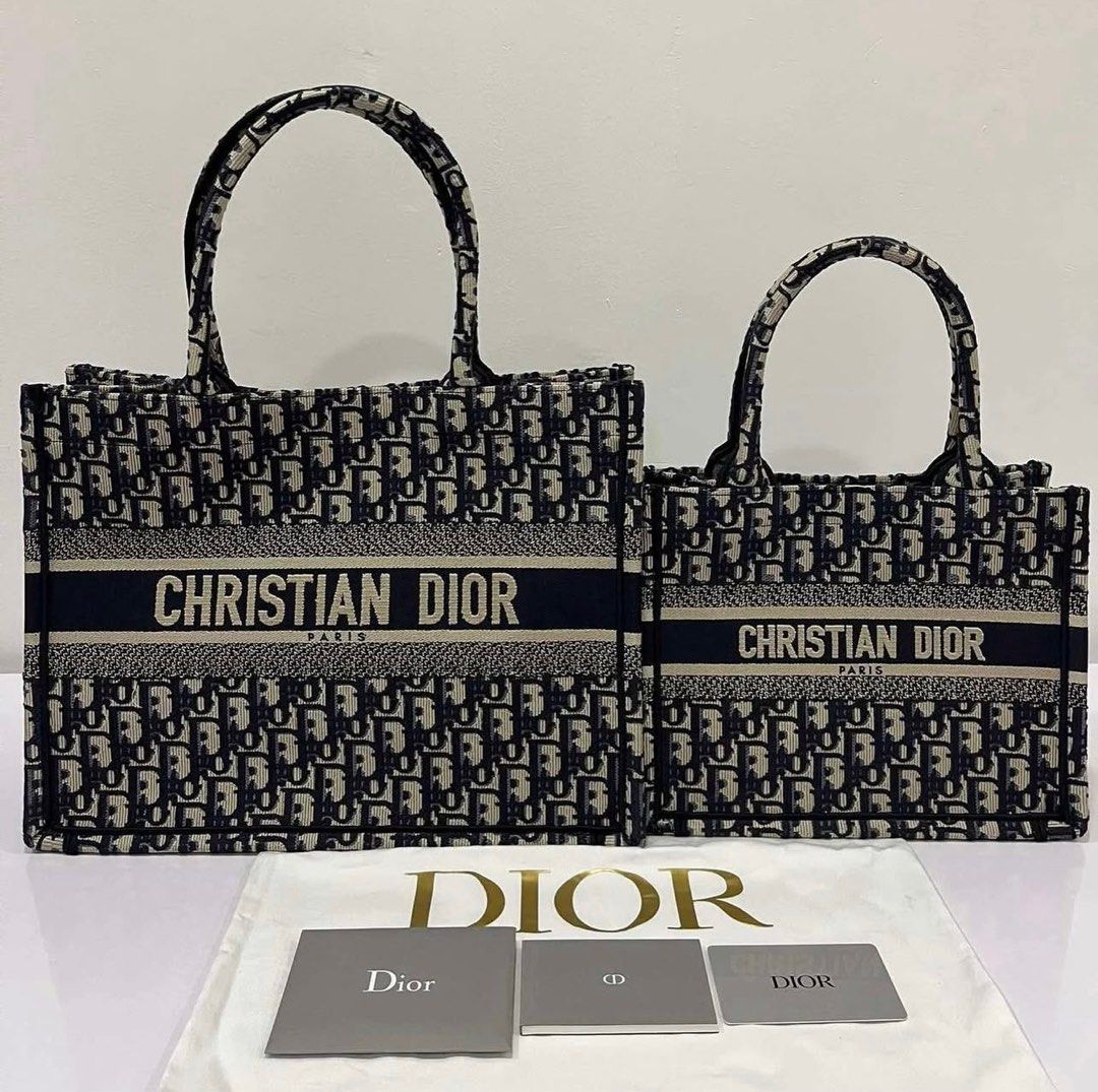 Dior Book Tote Medium (Category: Luxury Bags & Wallets) located in Quezon City. Submitted by mitsiandres (Listing ID 1350754749, Image 2). Description: Brandnew From Paris, France Comes with authenticity cards and dust bag SRP 200,000 PHP Main composition: cotton Christian Dior Paris signature on the front Dust bag included Size & Fit: Dimensions: 36 x 27.5 x 16.5 cm / 14 x 11 x 6.5 inches (Length x Height x Width) The bag’s large size can accomm