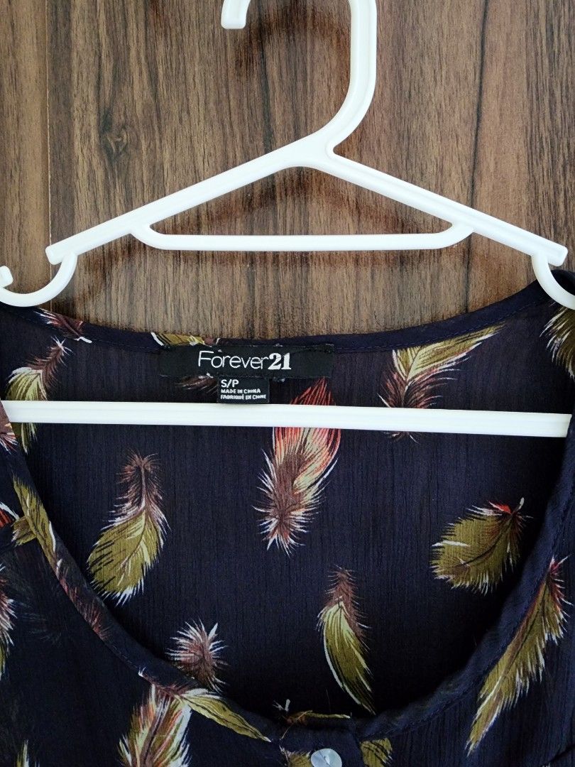 Forever 21 blouse (Category: Blouses) located in Quezon City. Submitted by declutterbcozynot (Listing ID 1350780998, Image 2). Description: no when worn pics last price posted low ballers will be blocked delivery to be shouldered by buyer.