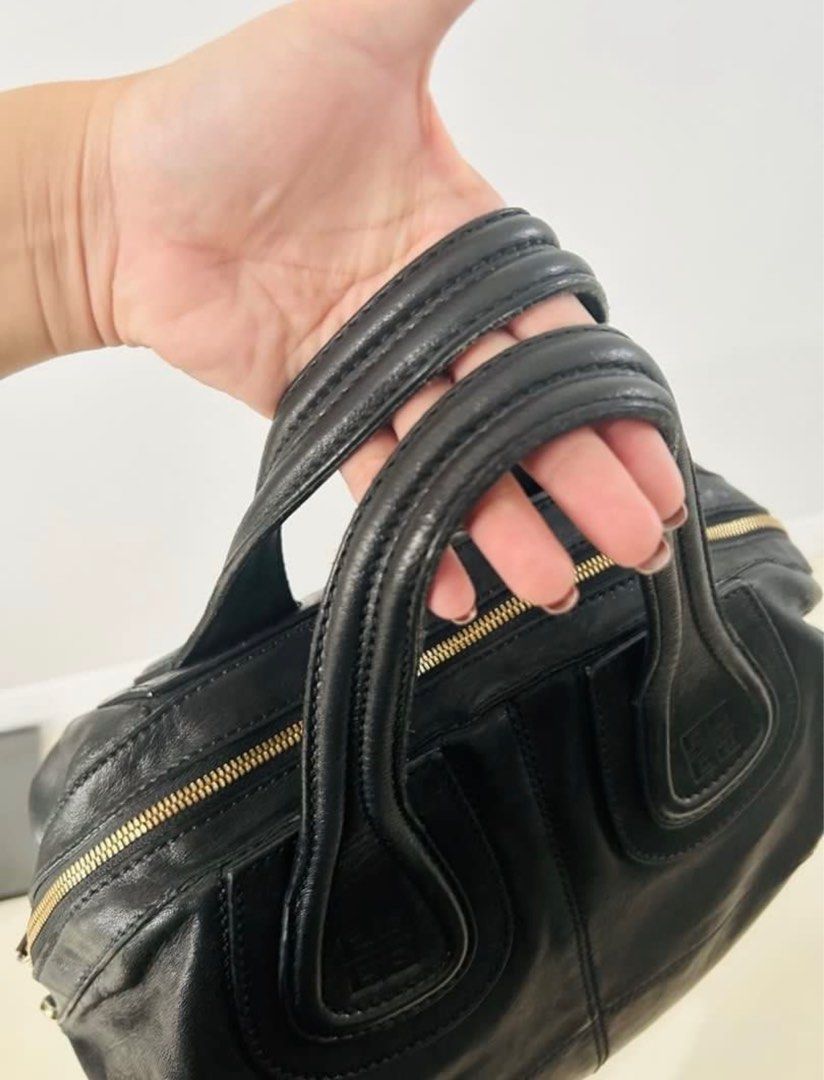 Givenchy Nightingale Medium Black (Category: Luxury Bags & Wallets) located in Manila. Submitted by pepperpotts22 (Listing ID 1350809045, Image 3). Description: Preloved authentic Givenchy Nightingale Medium Black Includes generic dust bag Bought from reputable online seller Slightly negotiable SF c/o buyer Location: Taguig.