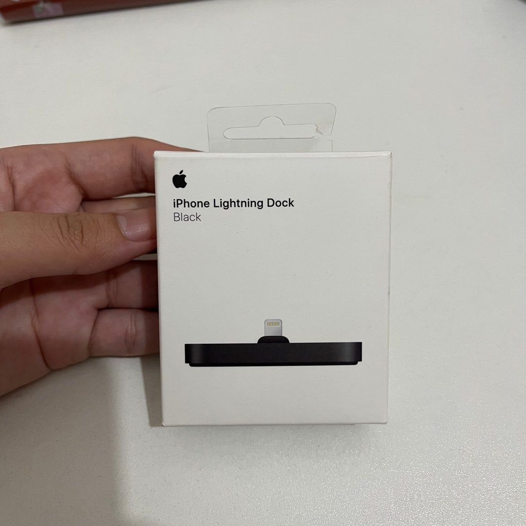iPhone Lightning Dock Black (Category: Chargers & Cables) located in Quezon City. Submitted by freshlumpia (Listing ID 1350874539, Image 1). Description: BRAND NEW !! Used once only to try if it works RFS: I accidentally got two of the same product lmao 💀 The dock provides 5 volts of power at up to 2.5 amps for quicker charging and includes a 3.5 mm audio jack to attach headphones or speakers. It does not support fast charging from a power adapt