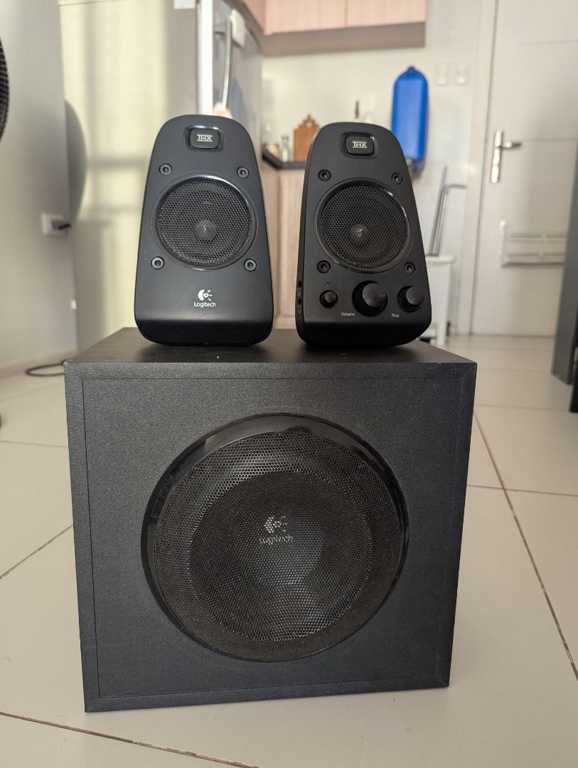 Logitech Z623 THX 2.1 Speaker System (Category: Soundbars, Speakers & Amplifiers) located in Quezon City. Submitted by augustus_rome (Listing ID 1350878354, Image 1). Description: Working. Good audio quality. THX Certified. ISSUE: May tear/punit sa isang speaker. Muddy/garalgal onti yung tunog. .