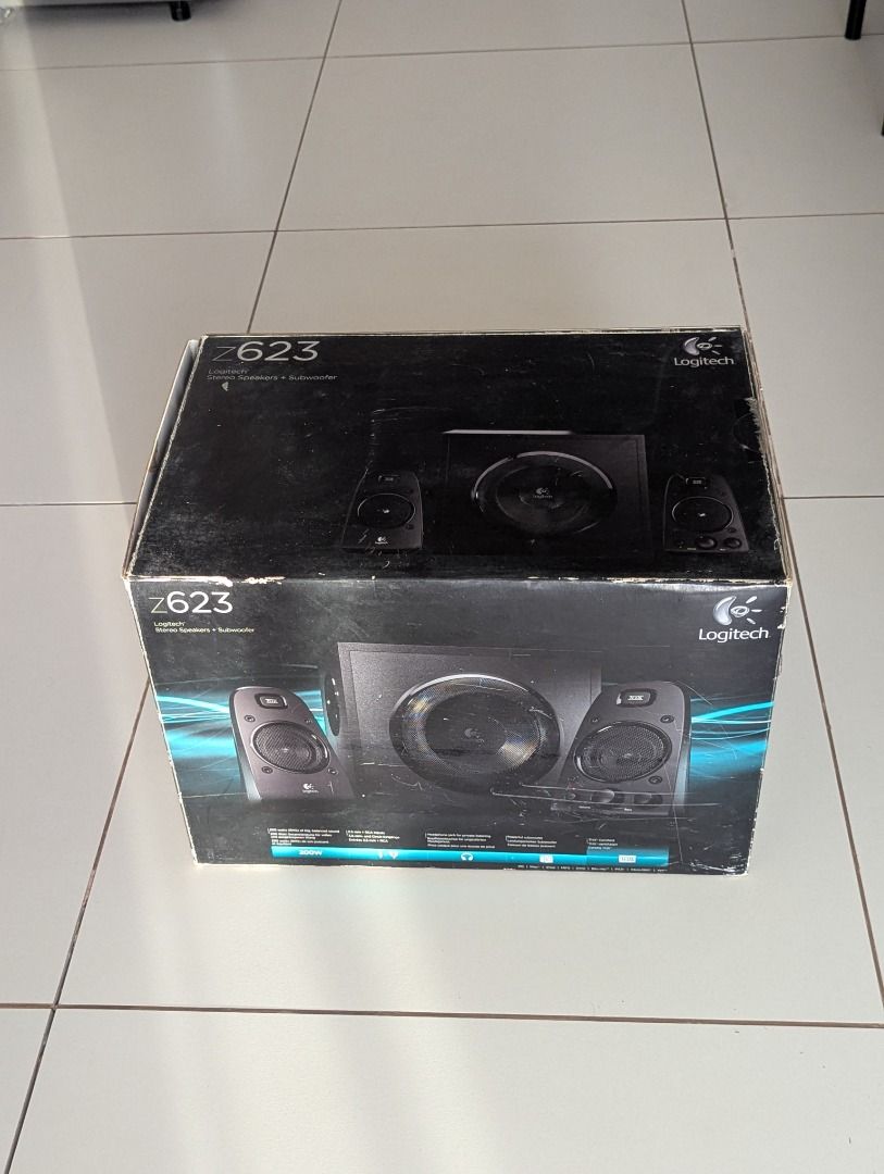 Logitech Z623 THX 2.1 Speaker System (Category: Soundbars, Speakers & Amplifiers) located in Quezon City. Submitted by augustus_rome (Listing ID 1350878354, Image 2). Description: Working. Good audio quality. THX Certified. ISSUE: May tear/punit sa isang speaker. Muddy/garalgal onti yung tunog. .