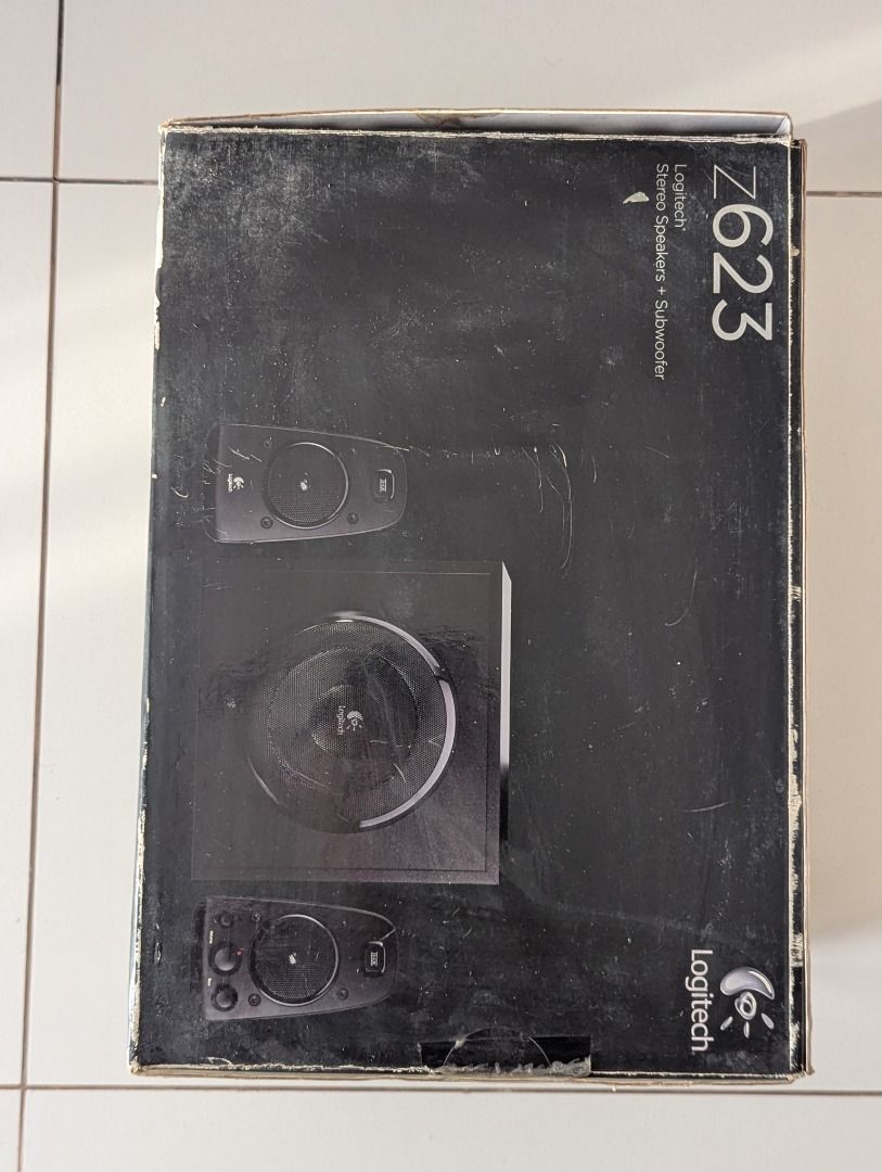Logitech Z623 THX 2.1 Speaker System (Category: Soundbars, Speakers & Amplifiers) located in Quezon City. Submitted by augustus_rome (Listing ID 1350878354, Image 3). Description: Working. Good audio quality. THX Certified. ISSUE: May tear/punit sa isang speaker. Muddy/garalgal onti yung tunog. .
