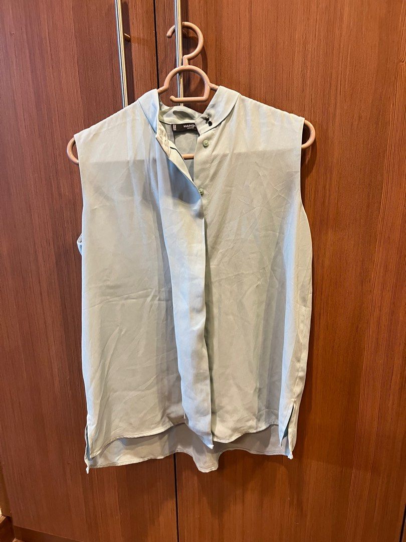 Mango Button down (Category: Blouses) located in Quezon City. Submitted by liz.ty (Listing ID 1350759334, Image 1). Description: Xs but actually fits medium frame Used once. In great condition. Selling low as i’m major decluttering my closet.
