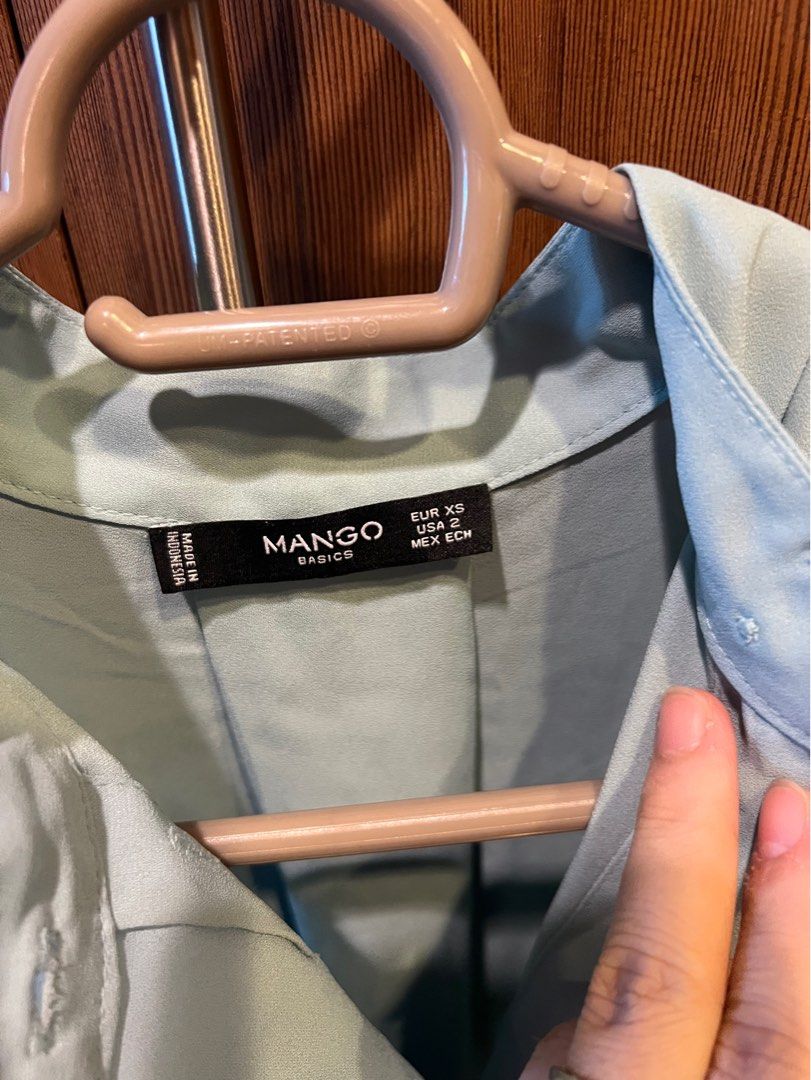 Mango Button down (Category: Blouses) located in Quezon City. Submitted by liz.ty (Listing ID 1350759334, Image 2). Description: Xs but actually fits medium frame Used once. In great condition. Selling low as i’m major decluttering my closet.
