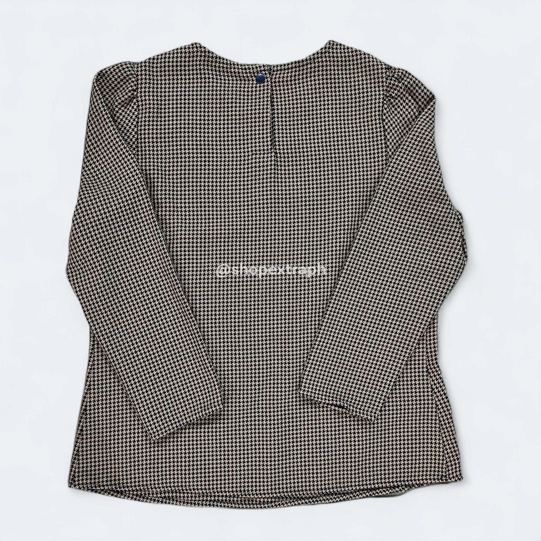 Mango Houndstooth Blouse (Category: Blouses) located in Paranaque City. Submitted by shopextraph (Listing ID 1350739691, Image 2). Description: [Pre-owned] MNG By Mango Basics Houndstooth Blouse Featuring a trendy houndstooth print in brown and black, this long sleeve blouse is perfect for any occasion. The round neck and basic style give it a classic touch, while the polyester and viscose material ensure comfort and durability. Size EU Small, US