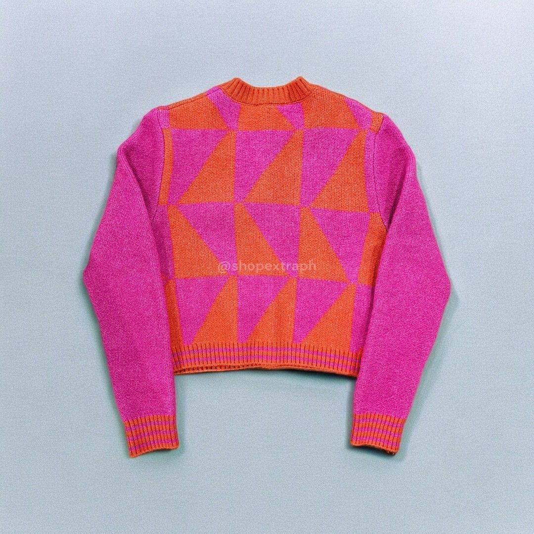 Mango Knitted Cardigan w/ Jewel Button (Category: Coats, Jackets and Outerwear) located in Paranaque City. Submitted by shopextraph (Listing ID 1350743303, Image 2). Description: [Pre-owned] Mango Knitted Cardigan w/ Jewel Button Wool mix fabric.Medium Knit. Straight design. Cropped design. Argyle Print. Round neck. Button fastening on the front section. Jewel effect buttons. Long sleeve. Color: Fuchsia Size: EU US Small Used 3x. No other inclusi