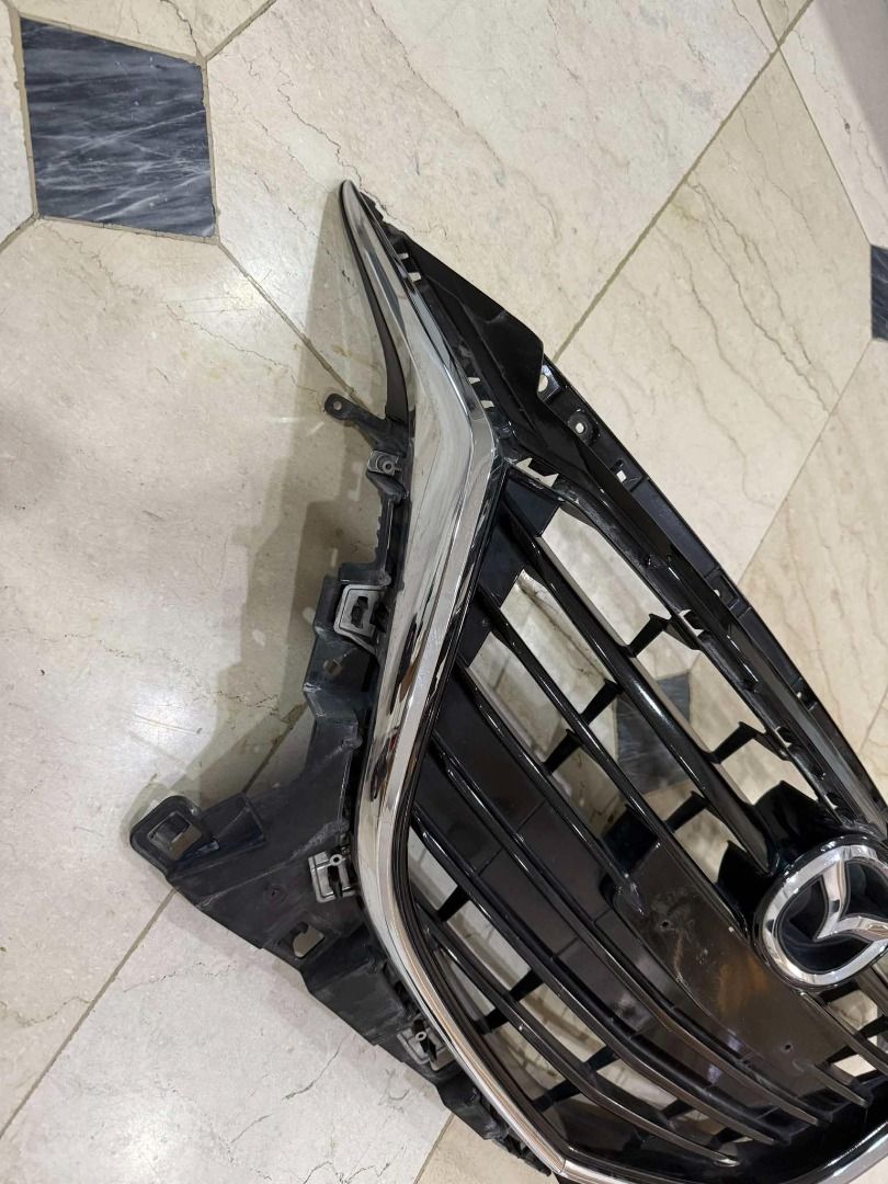 Mazda 3 2016 - Front Grill (Category: Body Parts and Accessories) located in Manila. Submitted by q_jay (Listing ID 1350863681, Image 2). Description: Mazda 3 2016 - Front Grill P 2,500 RFS: Upgrade.