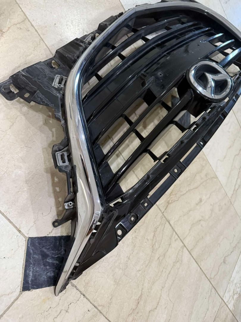 Mazda 3 2016 - Front Grill (Category: Body Parts and Accessories) located in Manila. Submitted by q_jay (Listing ID 1350863681, Image 3). Description: Mazda 3 2016 - Front Grill P 2,500 RFS: Upgrade.