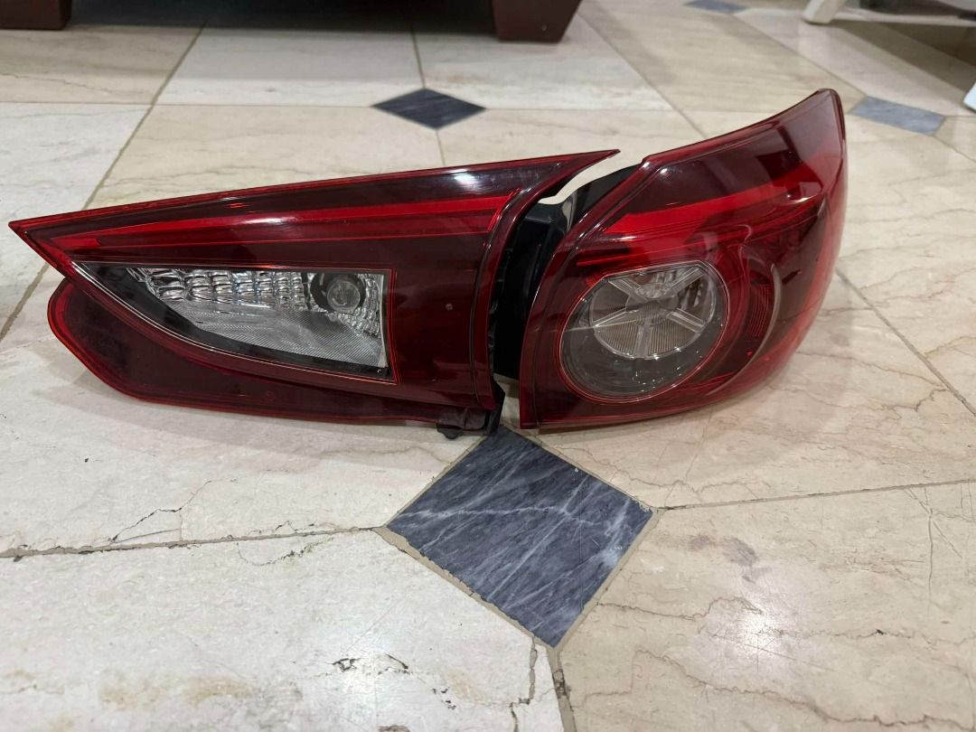 Mazda 3 2016 - Inner and Outer Tail Light (Category: Body Parts and Accessories) located in Manila. Submitted by q_jay (Listing ID 1350864531, Image 3). Description: Mazda 3 2016 - Inner and Outer Tail Light Used P 8,000.00 Issue: May maliit na pingas/chip sa left outer tail light. Di naman masyado pansin pero makikita niyo naman sa pics RFS: Upgrade.