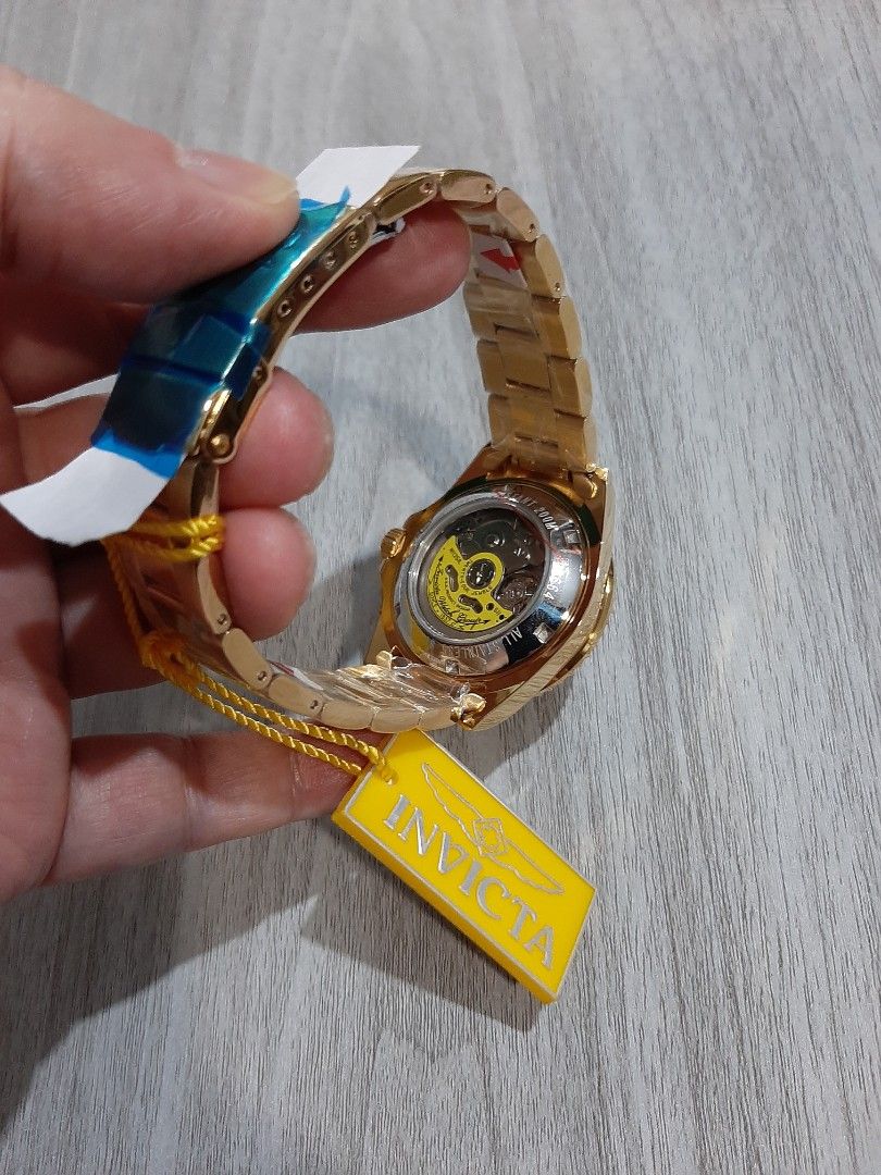 Original Invicta Pro Diver Automatic Unisex Watch (Category: Men's Watches) located in Mandaluyong City. Submitted by time_machine28 (Listing ID 1350850467, Image 3). Description: Ptpa, SALE...SALE...SALE... SALE...SALE...SALE... 6,800 pesos only Invicta Pro Diver Automatic Model 28664 Original/legit Brandnew Selling low Gold tone Black face Fit's up to 8 inches wrist Bought in u.s Unisex Size 40mm 09173459191 Mandaluyong here Mop:BDO or gcash Sr