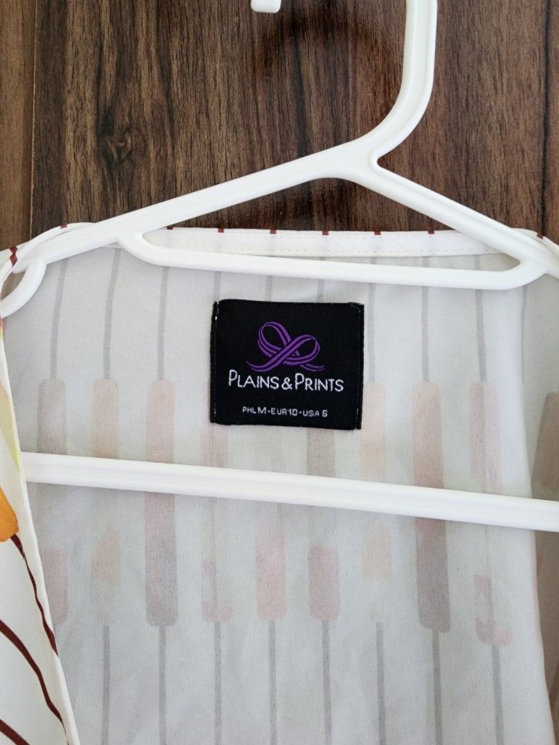 Plains and prints (Category: Blouses) located in Quezon City. Submitted by declutterbcozynot (Listing ID 1350780563, Image 2). Description: no when worn pics last price posted low ballers will be blocked delivery to be shouldered by buyer.