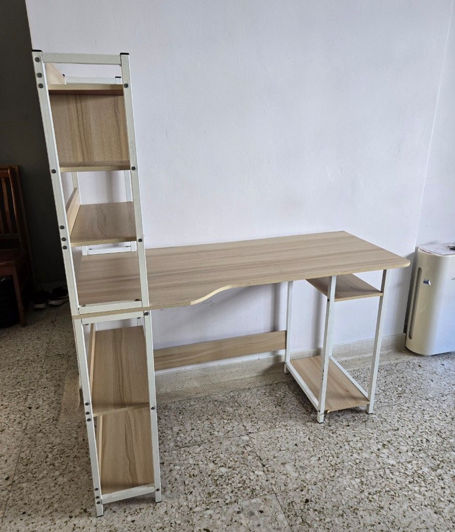 Study Table (Good Condition) (Category: Shelves, Cabinets & Racks) located in Singapore. Submitted by oddstone.fc7321 (Listing ID 1350812897, Image 2). Description: Study table with side shelving. Suitable for students with textbooks and exercise books needing space to organise while studying. Size L 120 x B 60 x H 140. Please arrange self collection and transport delivery..