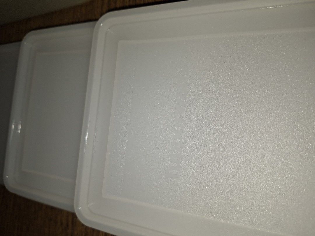 Tupperware Rectangle Shape 4pcs (Category: Food Organisation & Storage) located in Petaling Jaya. Submitted by unitedroad7 (Listing ID 1350771516, Image 3). Description: Rectangle Shape Tupperware Brand with cover. Various depth size. 25 x 13 cm.