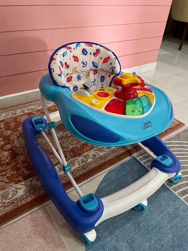 Walker (Category: Infant Playtime) located in Shah Alam. Submitted by baci9210 (Listing ID 1350724313, Image 2). Description: Sweetcherry 2 in 1 baby walker (SB215R) Lightly use 9/10.