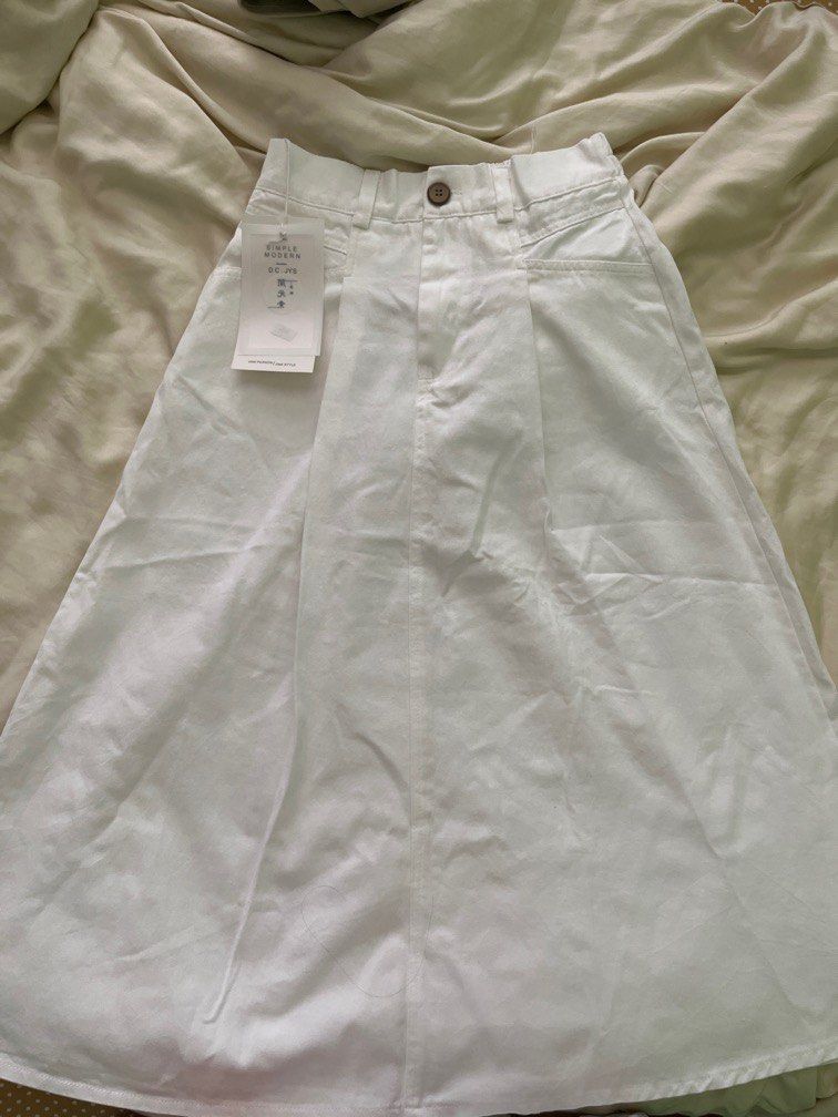 White Denim Skirt (Category: Skirts) located in Pasig City. Submitted by helloimnicee (Listing ID 1350721787, Image 2). Description: rfs: decluttering garterized.