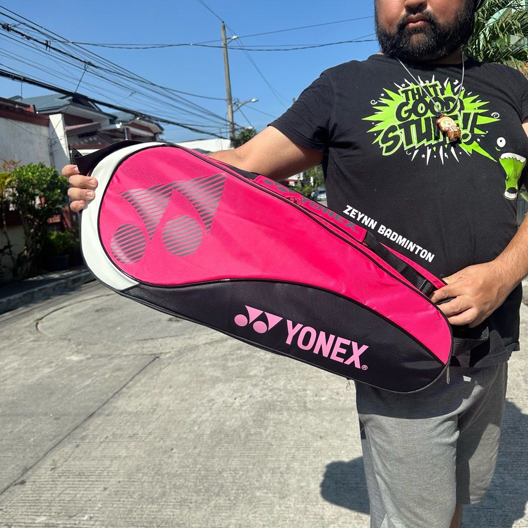 Yonex Badminton / Tennis Bag (Category: Racket and Ball Sports) located in Manila. Submitted by lvespinaa (Listing ID 1350836599, Image 2). Description: Onhand ‼️ Yonex Badminton / Tennis Bag - Pink - Has a 2 large compartment - Up to 3 to 4 rackets - Has a shoe compartment & shoulder straps - Material : PU Leather Price : ₱1k each Location : Las Piñas We offer pick up / meet up / delivery fee Mode of payment - Cash On Delivery ( Within metro man