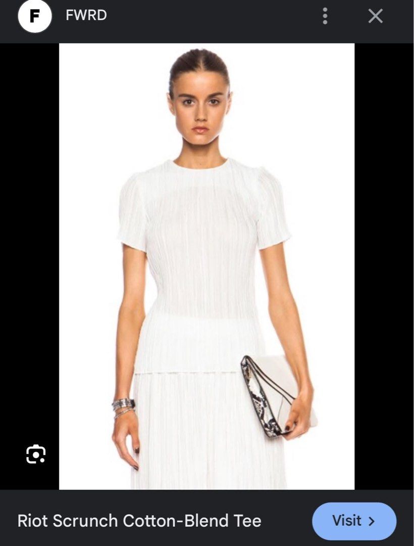 ZIMMERMANN RIOT PLISSE SCRUNCH TOP (Category: Blouses) located in Legazpi City. Submitted by gillesmonette (Listing ID 1350822876, Image 1). Description: ORIGINAL SIZE 0 on label SIZE SMALL KAYA til 34 bust complete necktag and hangtag.