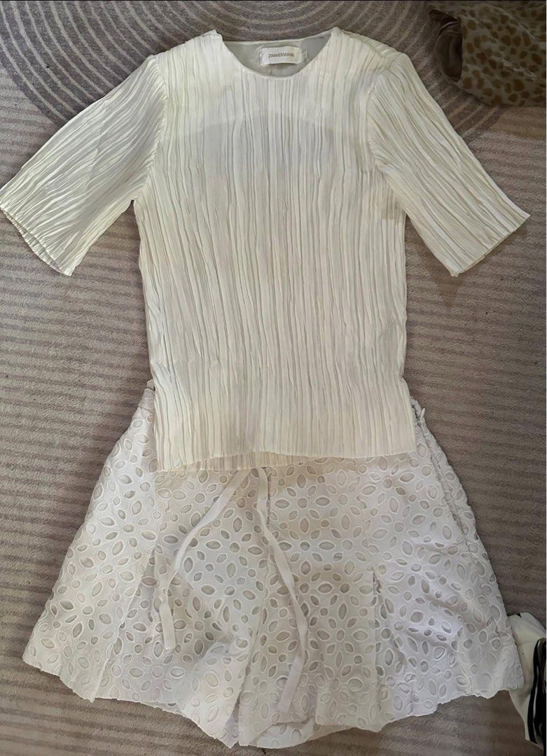 ZIMMERMANN RIOT PLISSE SCRUNCH TOP (Category: Blouses) located in Legazpi City. Submitted by gillesmonette (Listing ID 1350822876, Image 3). Description: ORIGINAL SIZE 0 on label SIZE SMALL KAYA til 34 bust complete necktag and hangtag.