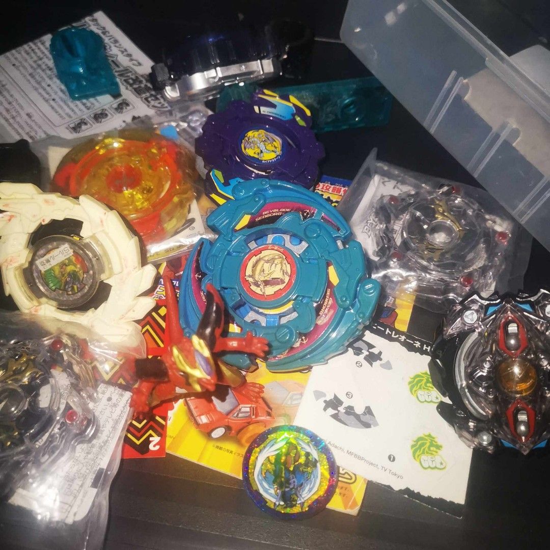 AUTHENTIC Beyblade Bundle Parts with Official Sticker and Accessories (Category: Action & Battle Toys) located in Baliuag. Submitted by mikeeoncarousel (Listing ID 1353997921, Image 2). Description: Batch No. BEY01 Package includes: 1x AUTHENTIC Beyblade Bundle Parts with Official Sticker and Accessories NOTE !!!!!!!!! CONDITION: LOOSE AS IS ONLY!!!! AS IS ONLY!!!! AS IS ONLY!!!! Item will be shipped safely with BUBBLEWRAP unlike other sellers Au
