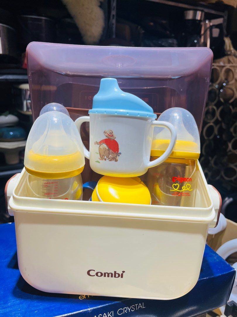 Baby Needs take all (Category: Breastfeeding & Bottle Feeding) located in Pilar. Submitted by faveanyshop (Listing ID 1354117194, Image 2). Description: Take all baby needs Combi Sterilizer pigeon feeding bottles baba feeding bottles combi train cup and cath kidston train cup.