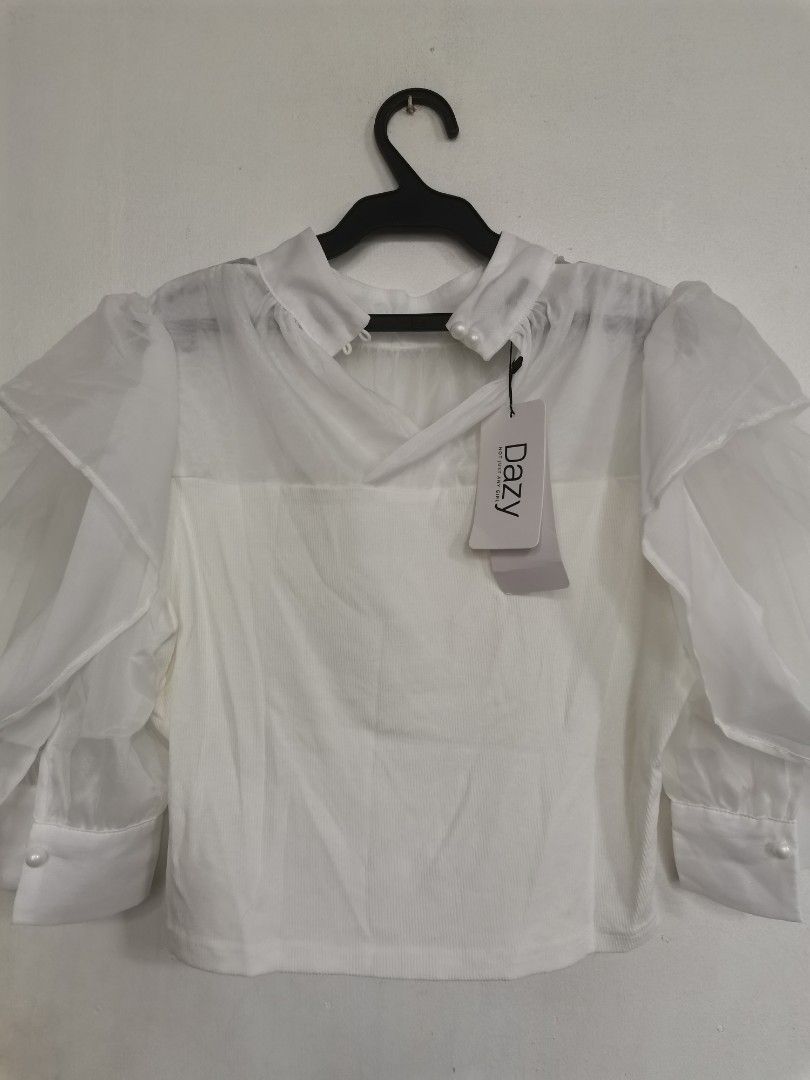 Dazy Friful White Blouse Top (Category: Blouses) located in Marikina City. Submitted by declutterkpcloset (Listing ID 1354047198, Image 2). Description: Size medium Color white.