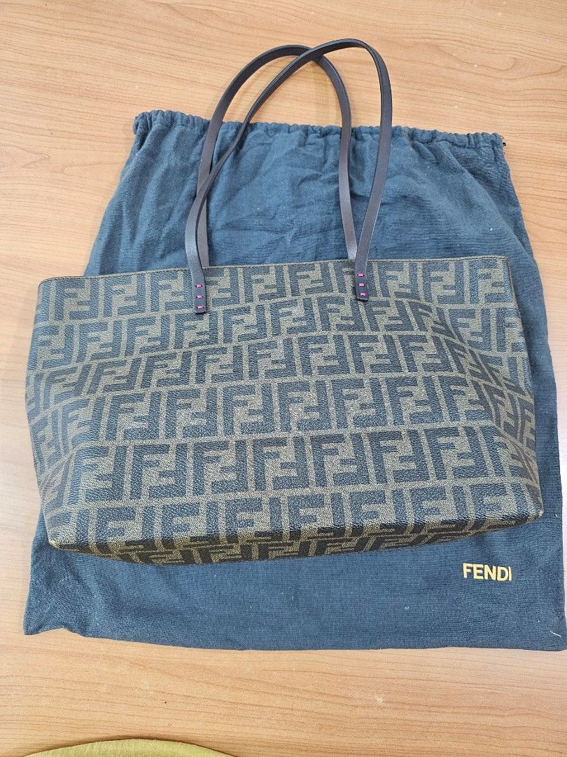 Fendi Zucca tote bag PM size (Category: Luxury Bags & Wallets) located in Las Pinas. Submitted by vanpru (Listing ID 1354133843, Image 1). Description: Fendi Zucca tote bag PM size Very good condition. With cards and dust bag. Minimal rubs on corners only. RFS: not being used, decluttering.