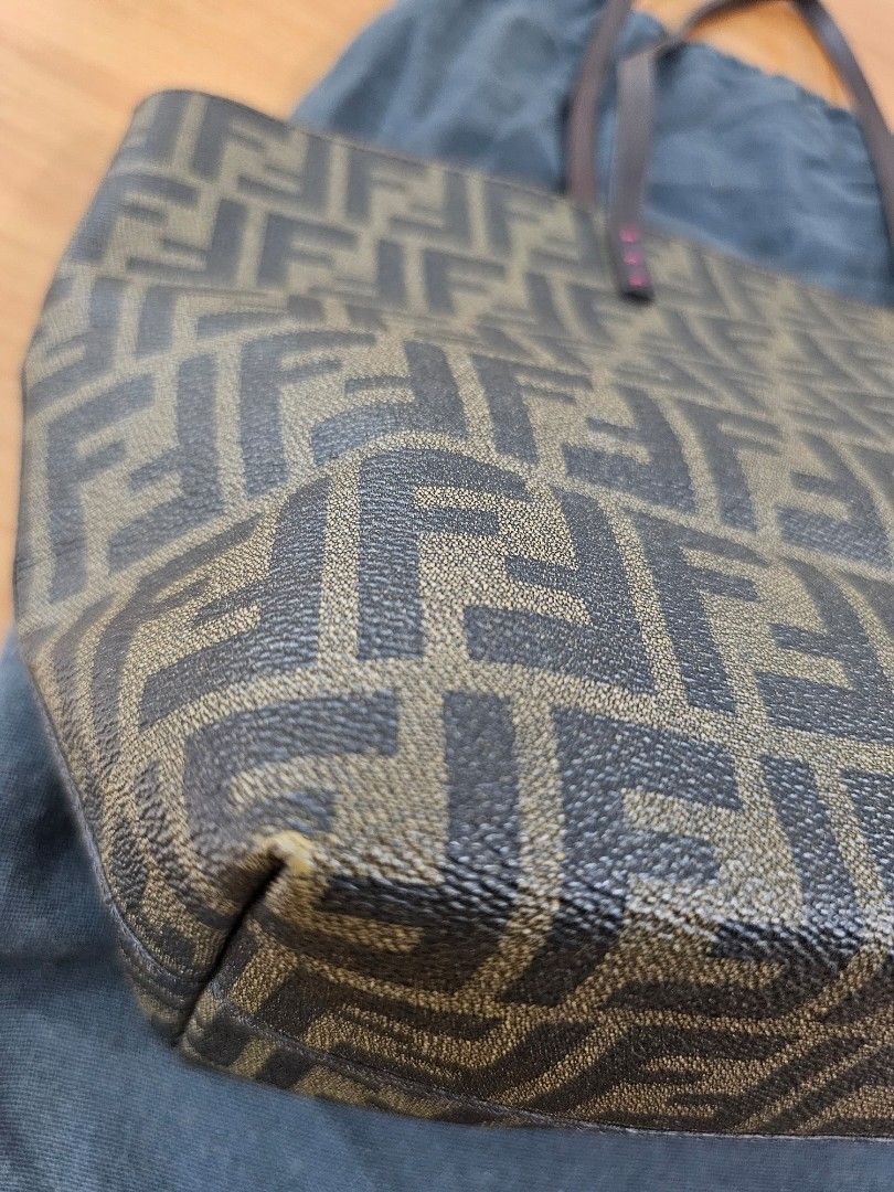Fendi Zucca tote bag PM size (Category: Luxury Bags & Wallets) located in Las Pinas. Submitted by vanpru (Listing ID 1354133843, Image 3). Description: Fendi Zucca tote bag PM size Very good condition. With cards and dust bag. Minimal rubs on corners only. RFS: not being used, decluttering.