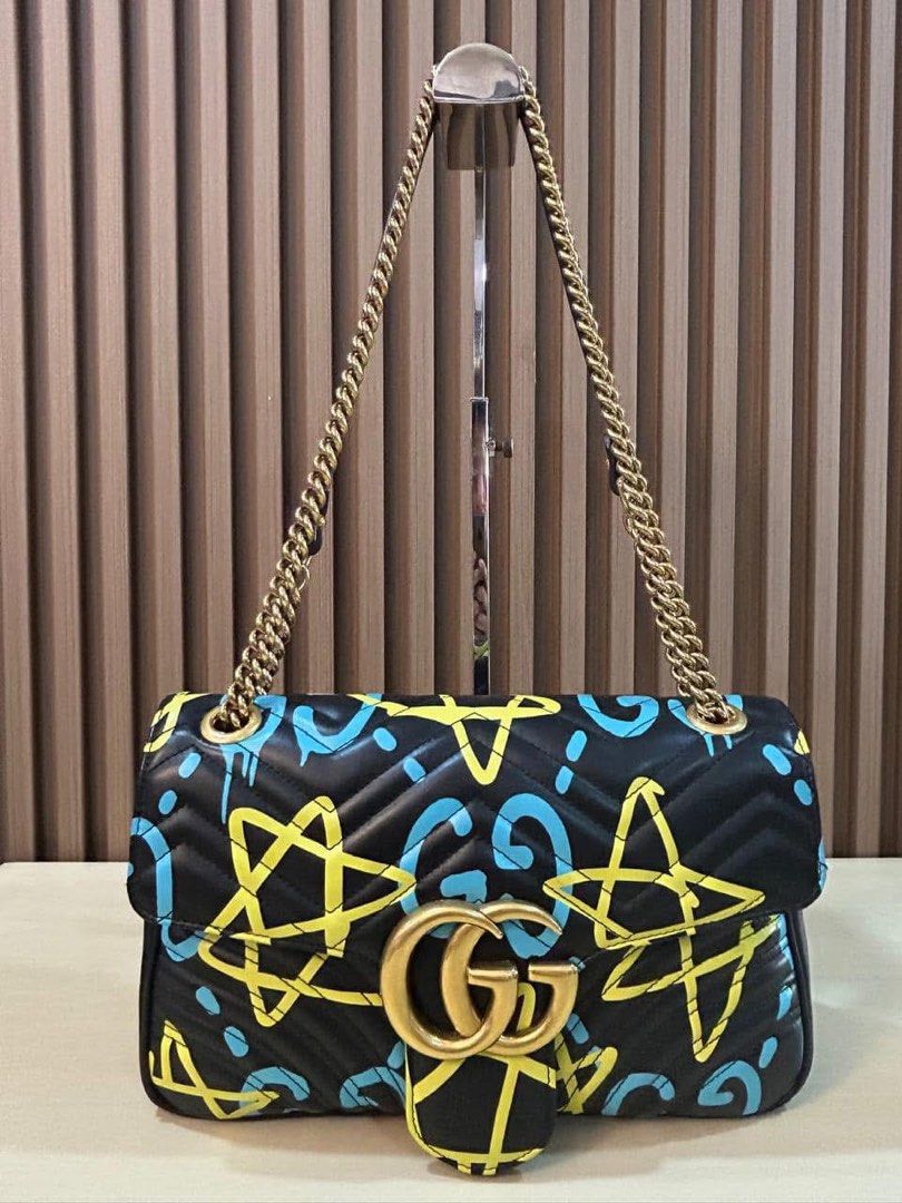 GG Medium Marmont Graffiti Shoulder Bag (Category: Luxury Bags & Wallets) located in Manila. Submitted by bagislifeshop (Listing ID 1354120387, Image 2). Description: ✅Condition: 8.8/10 ( Limited Ed) ✅Colour: Black and multicoloured graffiti ✅Size: 29 X 18 X 7CM ✅Inclusion: dustbag and cards .