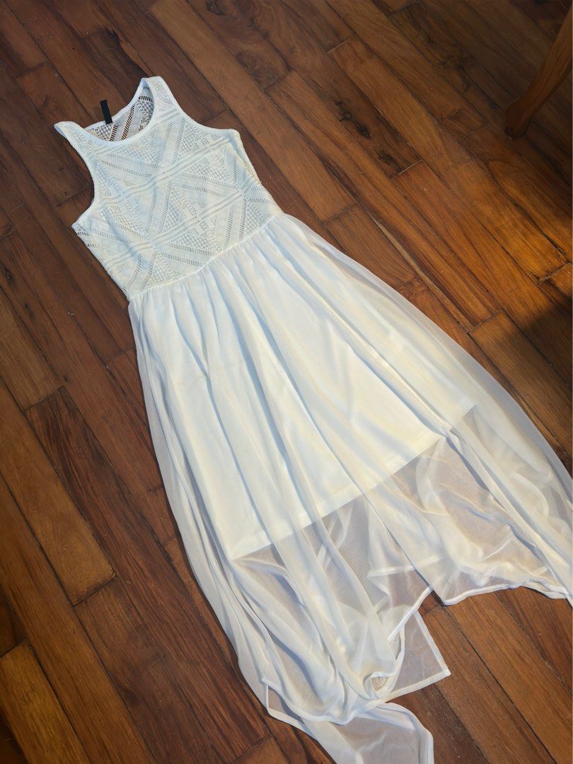H&M White Long Dress (Category: Dresses) located in Mariveles. Submitted by declutterwithina (Listing ID 1354045545, Image 2). Description: Never used Perfect as beach dress Has washable stains due to storage LBC or J&T delivery during weekends.