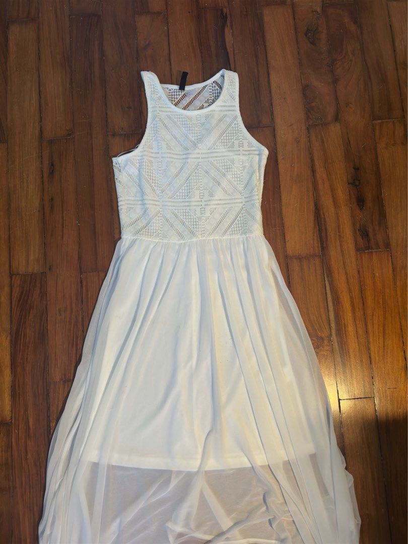 H&M White Long Dress (Category: Dresses) located in Mariveles. Submitted by declutterwithina (Listing ID 1354045545, Image 1). Description: Never used Perfect as beach dress Has washable stains due to storage LBC or J&T delivery during weekends.