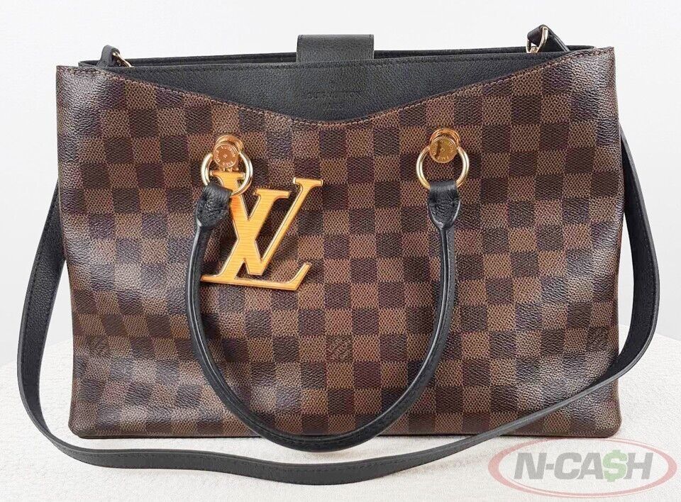 Louis Vuitton Black Riverside Damier Ebene Canvas Bag (Category: Luxury Bags & Wallets) located in Quezon City. Submitted by luxury_by_n-cash (Listing ID 1354061607, Image 1). Description: N-Cash Pawnshop "Instant Cash for Bags, Watches, Cars, and Electronics" https://www.ncash-pawnshop-philippines.com/ Louis Vuitton Black Riverside Damier Ebene Canvas Bag PRE-OWNED Brand: LOUIS VUITTON Measures: 14″ L x 9.5″ H x 4.5″ D (approx) 7″ Double Handle 