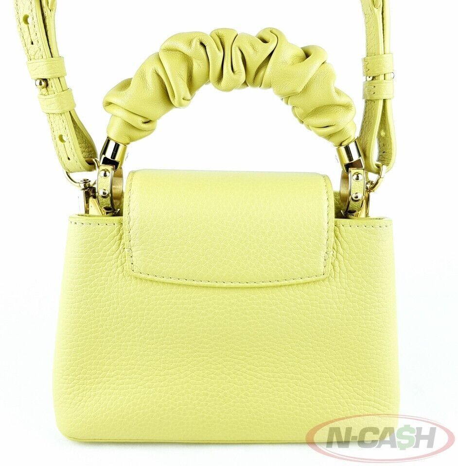 NCash Philippines - Louis Vuitton Mini Capucines Jaune Scrunchie Bag (Category: Luxury Bags & Wallets) located in Quezon City. Submitted by luxury_by_n-cash (Listing ID 1354000409, Image 2). Description: N-Cash Pawnshop "Instant Cash for Bags, Watches, Cars, and Electronics" https://www.ncash-pawnshop-philippines.com/ Trusted since 2006 100% authentic with money-back guarantee Louis Vuitton Mini Capucines Jaune Scrunchie Bag Measures: 7.75″ L x 5