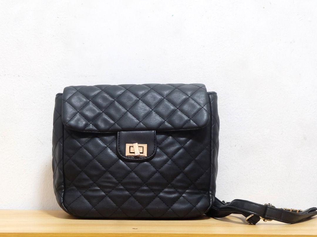 Quilted Backpack - Small, Black (Category: Backpacks) located in Makati City. Submitted by _authenticity (Listing ID 1354007148, Image 1). Description: Color: BLACK *Colors may vary slightly due to lighting. This is a pre-loved item so please manage your expectations..