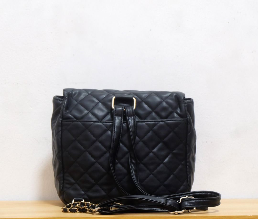 Quilted Backpack - Small, Black (Category: Backpacks) located in Makati City. Submitted by _authenticity (Listing ID 1354007148, Image 2). Description: Color: BLACK *Colors may vary slightly due to lighting. This is a pre-loved item so please manage your expectations..