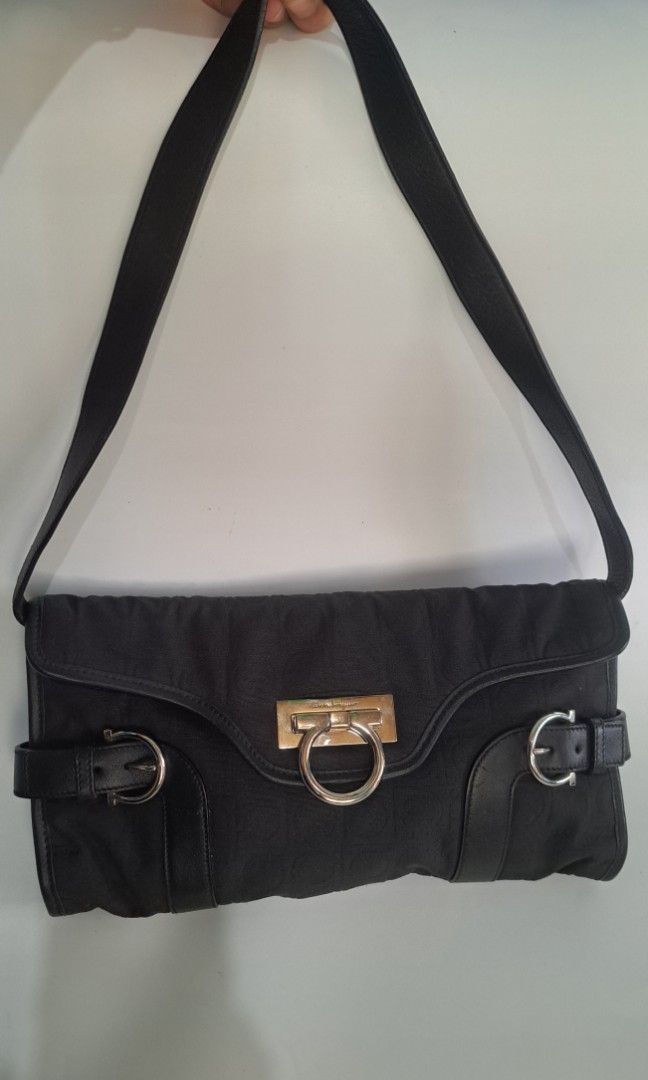 Salvatorre ferragamo (Category: Luxury Bags & Wallets) located in Batangas. Submitted by venus232nd (Listing ID 1354153248, Image 1). Description: authentic,clutch/shoulder bag.