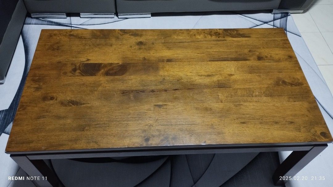Solid wood coffee table (Category: Coffee & Tea Tableware) located in Singapore. Submitted by jkkian (Listing ID 1354110536, Image 2). Description: Beautiful design coffee table.super solid wood. Dimensions : L 106cm W 56cm H 45cm Free delivery.