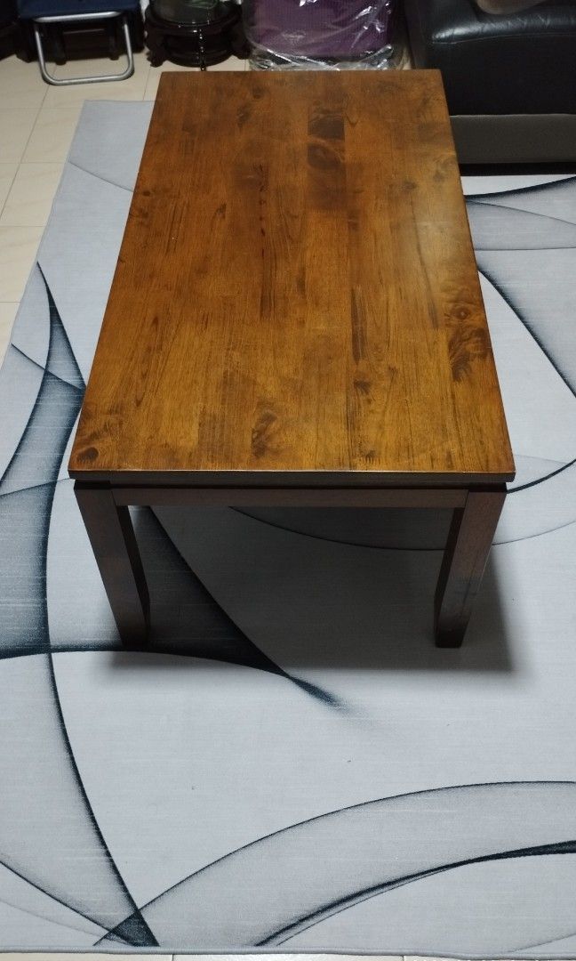 Solid wood coffee table (Category: Coffee & Tea Tableware) located in Singapore. Submitted by jkkian (Listing ID 1354110536, Image 3). Description: Beautiful design coffee table.super solid wood. Dimensions : L 106cm W 56cm H 45cm Free delivery.