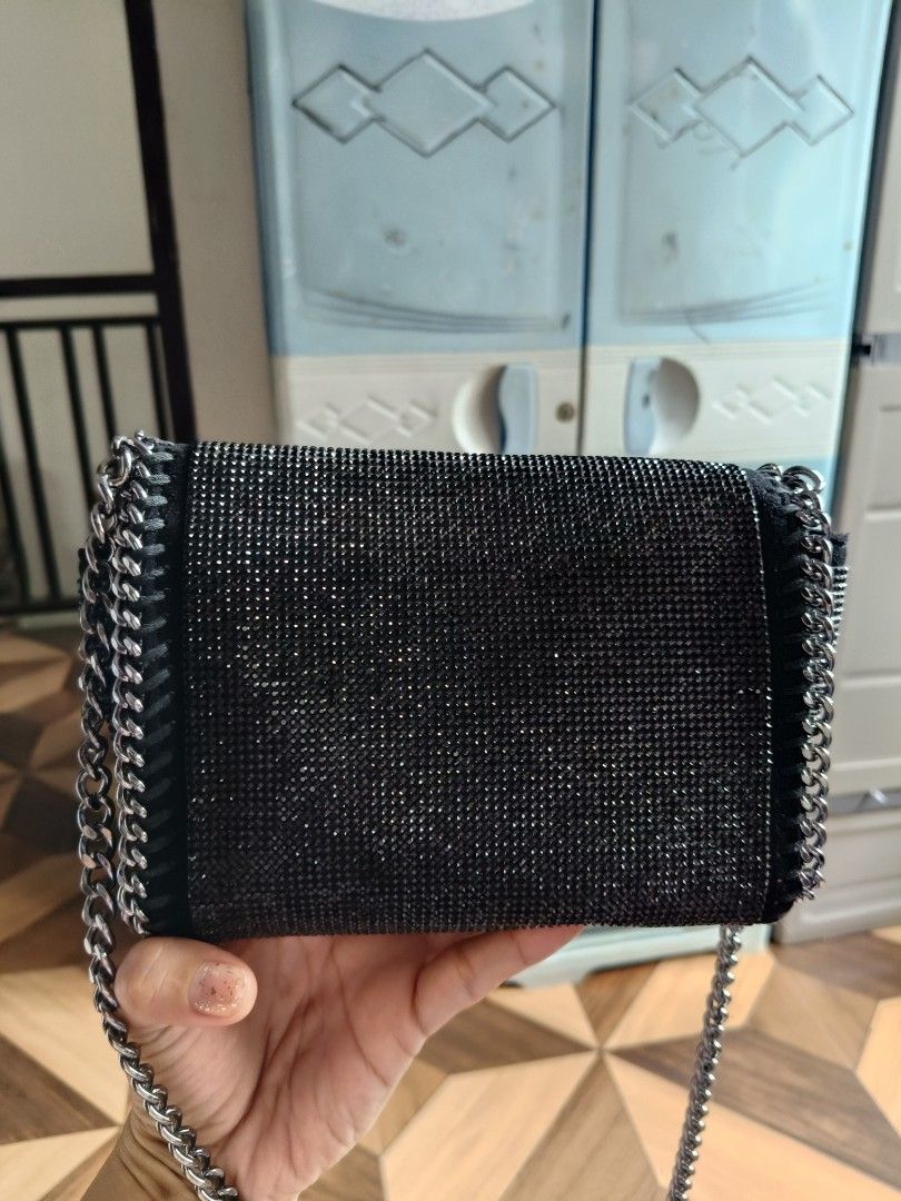 Stella McCartney Small Falabella Sling Bag (Category: Luxury Bags & Wallets) located in Batangas. Submitted by lynmejlight (Listing ID 1354018135, Image 2). Description: Stella McCartney Small Size Sling/Crossbody Bag. With normal sign of used sa minimal part ng chain sling sa ilalim at sa left side (not obvious) See last 2 photos. Very nice ng pgkacolor nya at kintab. Kasya cp at ang ganda/sosyal nya pagsuot😍.