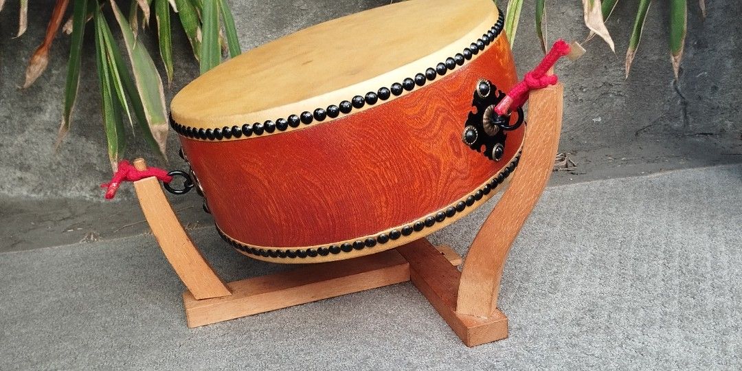 Taiko Flat drum japan musical instruments collection Display (Category: Musical Instruments) located in Malabon City. Submitted by immortalpicker (Listing ID 1354137308, Image 1). Description: Taiko Flat drum japan musical instruments Estimate size H= 6 1/2 inches Diameter = 14 1/2 Inches Material = wood - leather From Japan 2nd hand with scratch No warranty If there's Damage or Issues they can be seen in the last picture Price = 9,500 My locatio