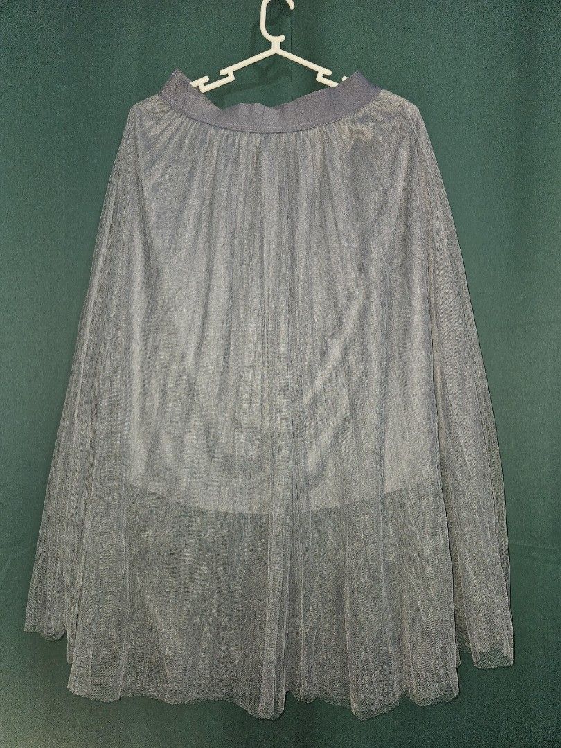 Tulle Skirt | M - 1XL (Category: Skirts) located in Manila. Submitted by plueberry.ph (Listing ID 1354109707, Image 1). Description: Grey blue in actual Like new 3 layers: 2 layer mesh and cotton inner Waist: 26-46in max stretch Length: 31-32in Bagsak sha, ang ganda 👌🏻 Onhand Actual photos, indoor with flash. Loc: Betterliving Parañaque MOD: Same day delivery c/o buyer Payment first.