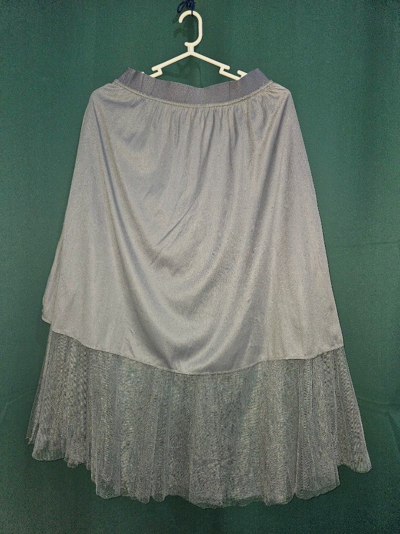 Tulle Skirt | M - 1XL (Category: Skirts) located in Manila. Submitted by plueberry.ph (Listing ID 1354109707, Image 2). Description: Grey blue in actual Like new 3 layers: 2 layer mesh and cotton inner Waist: 26-46in max stretch Length: 31-32in Bagsak sha, ang ganda 👌🏻 Onhand Actual photos, indoor with flash. Loc: Betterliving Parañaque MOD: Same day delivery c/o buyer Payment first.