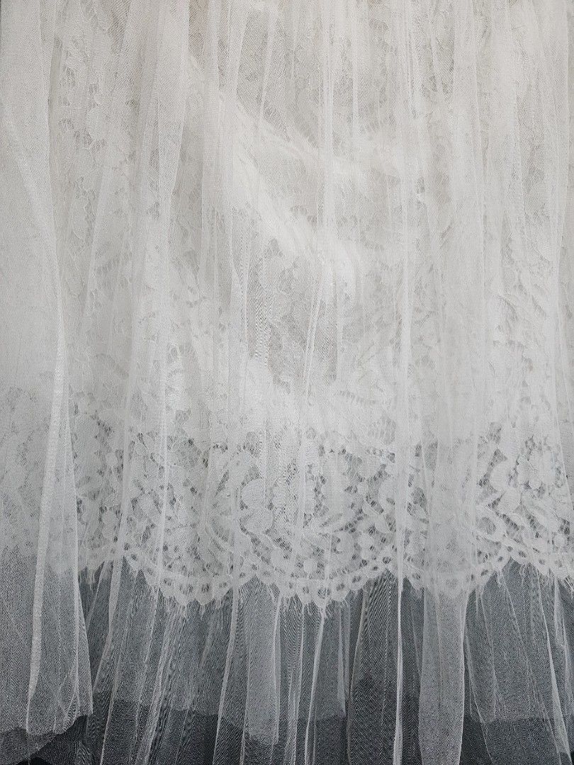 Tulle Skirt | M - XL (Category: Skirts) located in Manila. Submitted by plueberry.ph (Listing ID 1354111869, Image 3). Description: White na white 🤍 Clean and unused condition No brand Waist: 26-44in max stretch Length: 28in 3 layers: mesh, lace and silky inner. (need halfslip, kinda see through) Onhand, ang ganda 😊 Actual photos, indoor, no flash. Loc: Betterliving Parañaque MOD: Same day delivery c/o buyer Payment first.