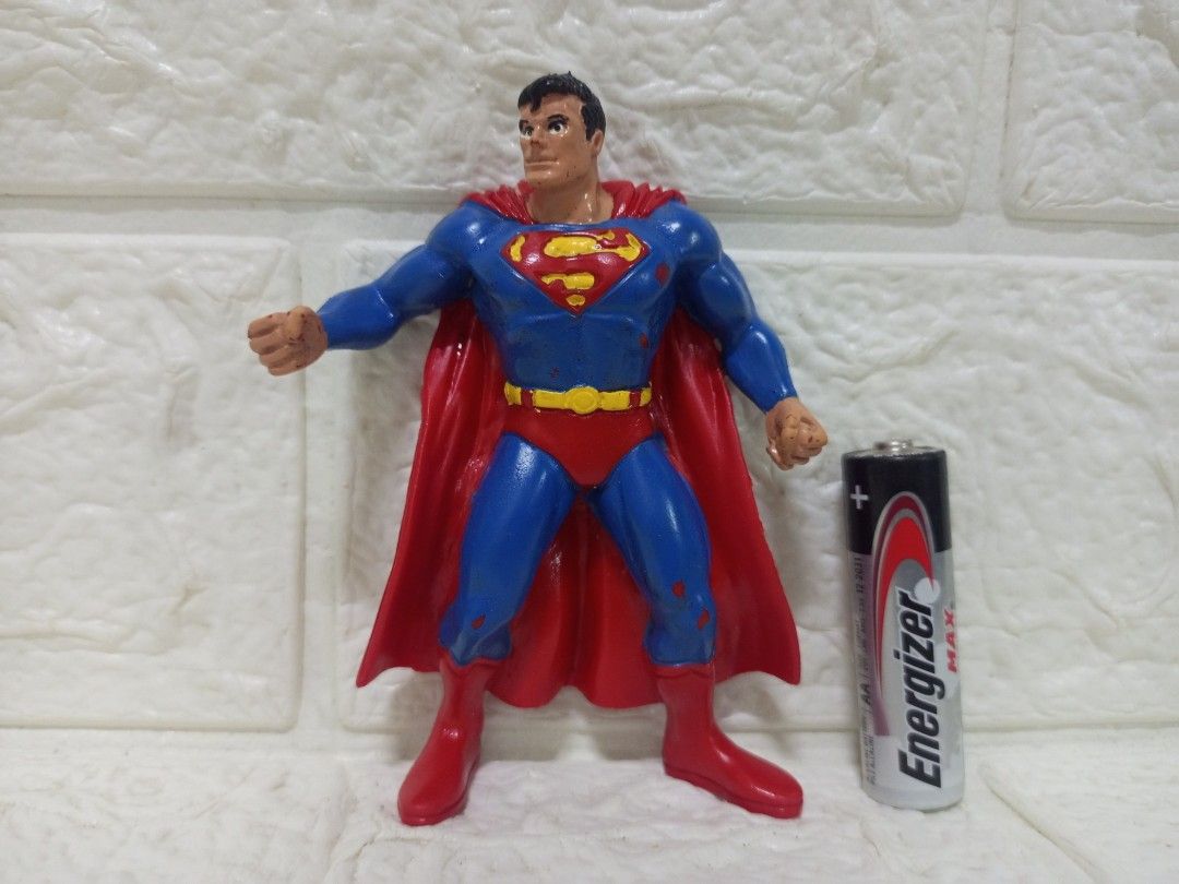 Vintage 1992 DC Comics SuperMan Rubber Figure (Category: Figurines & Statues) located in Quezon City. Submitted by mackylolz (Listing ID 1354031783, Image 2). Description: 1992 DC Comics SuperMan Figure Authentic with Markings Have Many Paint chips (see pic) What you See is what u get Pls See pic For Details.