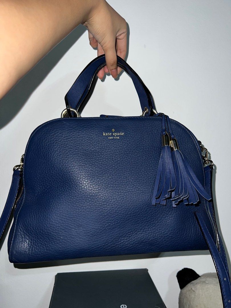 Authentic Kate Spade Navy Blue Leather Tassel (Category: Luxury Bags & Wallets) located in Quezon City. Submitted by dluvrx (Listing ID 1354279352, Image 1). Description: price is negotiable!! padala from U.S orig price is ₱11k js a bit deformed but can be fixed ^^ no flaws 9/10 condition need lang ng linis since nastock .