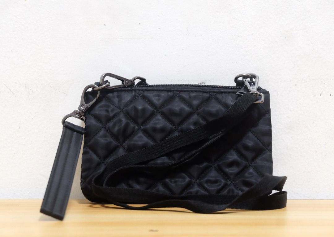 BEABI Quilted Pouch Cross-body Bag (Category: Purses & Pouches) located in Makati City. Submitted by _authenticity (Listing ID 1354177653, Image 1). Description: Color: BLACK *Colors may vary slightly due to lighting. This is a pre-loved item so please manage your expectations..