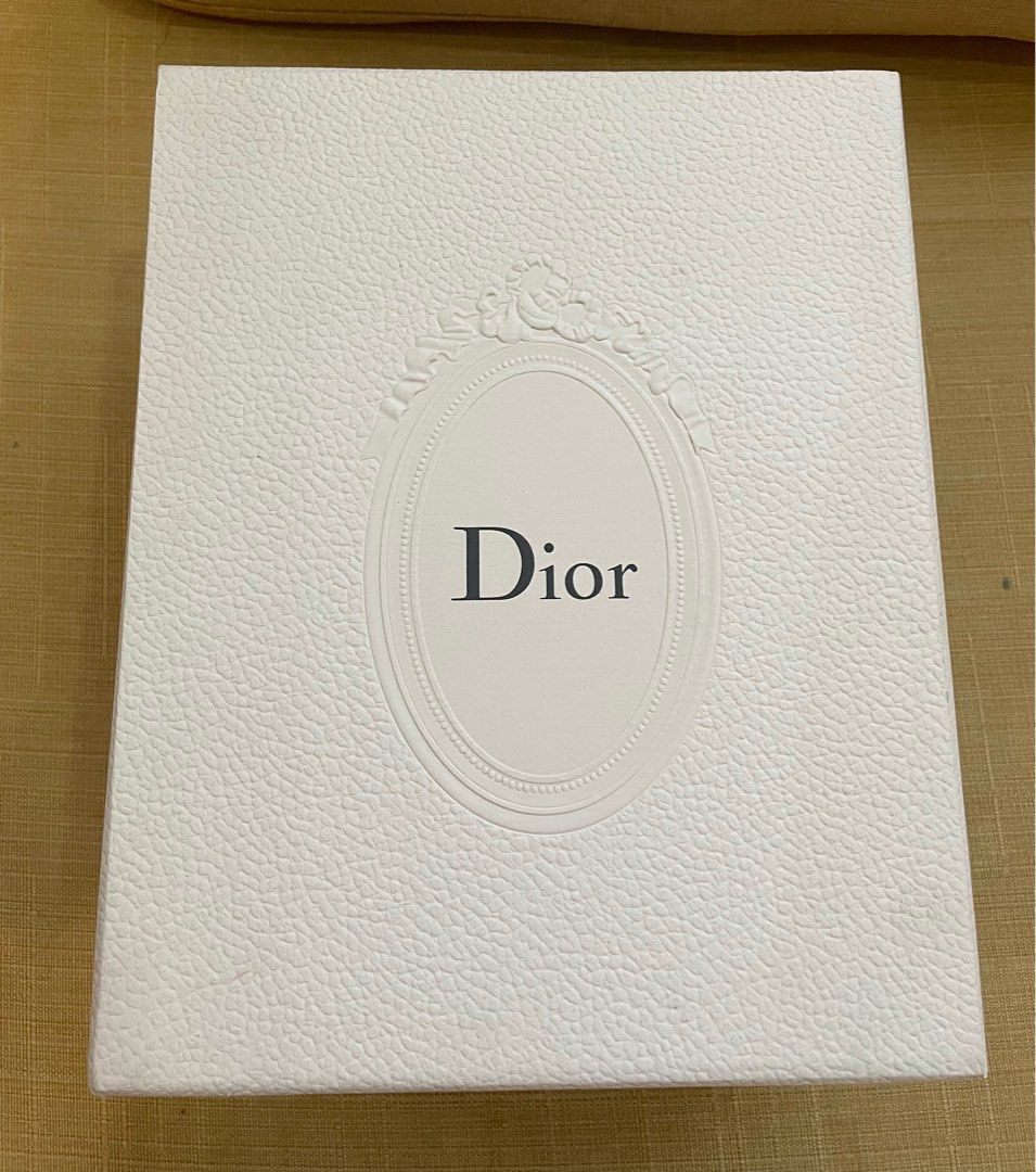 Dior Box (Category: Luxury Bags & Wallets) located in Cebu City. Submitted by kiki_closet168 (Listing ID 1354208495, Image 1). Description: Authentic box w/pamphet lady dior n ribbon Size 21.5cm x 27cm x 13cm .